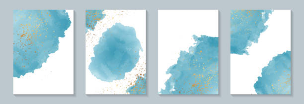 istock Watercolor background with abstract blue ink stains and golden glitter on a white. 1334979172