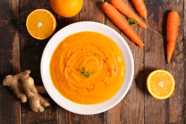 istock carrot and orange fruit soup 1334981557