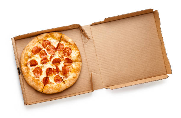 istock Pizza in a cardboard box isolated on white background. Top view of pizza package. 1334982654