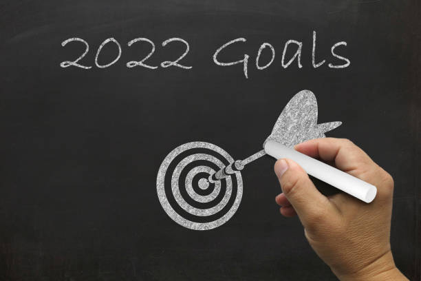 istock New year 2022 resolutions goal target blackboard 1334984050