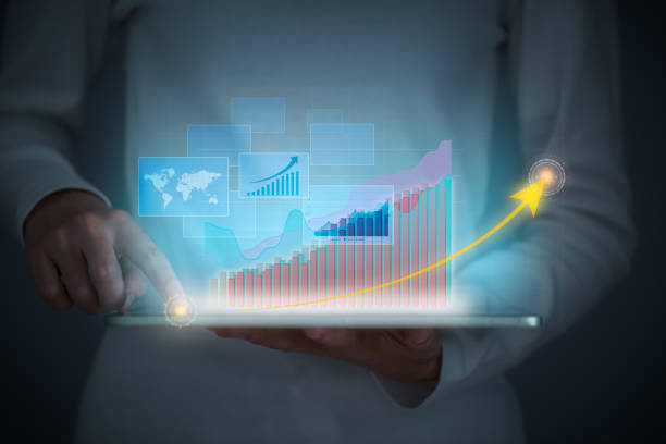 istock Business human analyzing financial report from tablet. planning and strategy, business infographics and graphs,  stock market, market analysis, business growth, progress or success concept. 1334984788