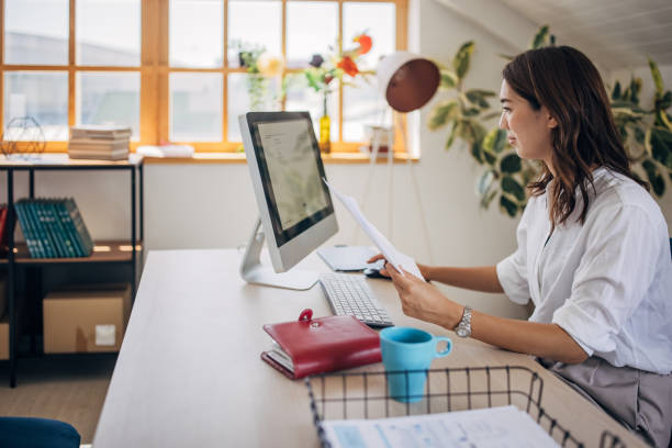 istock Businesswoman working in office 1334985084