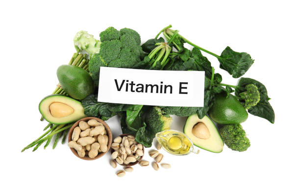 istock Card with phrase Vitamin E and different products on white background, top view 1334989632