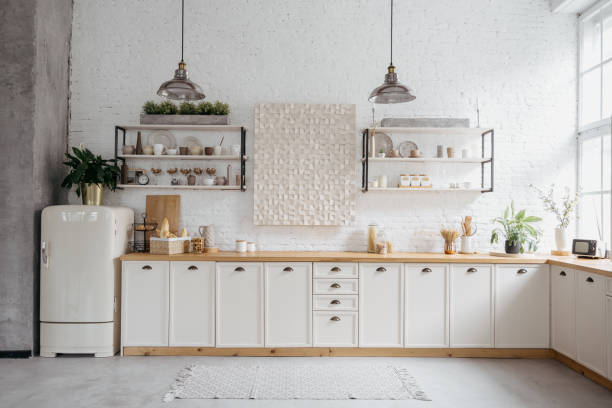 Rustic kitchen interior with white brick wall. Rustic kitchen interior with white brick wall. Modern room design with wooden furniture, cozy home with vintage decoration. Tabletop with food, shelves with ceramic kitchenware. farmhouse stock pictures, royalty-free photos & images