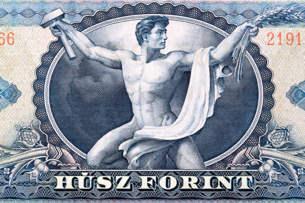 istock Penthathlete Csaba Hegedus with hammer from old Hungarian money 1334998832