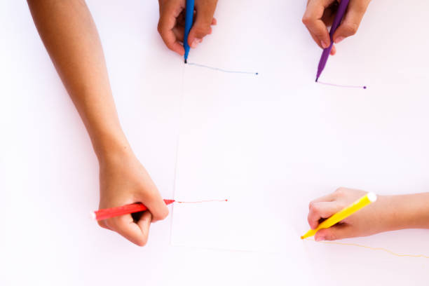 istock Close-up of children drawing whit felt tip pens 1334999955