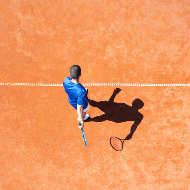 istock Tennis Player Preparing to Shoot for a First Service 1335000191