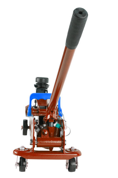 istock red hydraulic car jack isolated on white background, lowered 1335004160