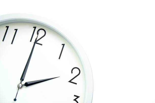 istock A wall clock that announces 2 o'clock on the hour 1335006251