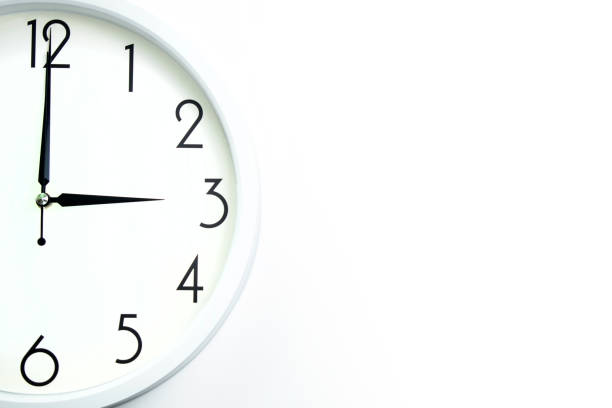 istock A wall clock that announces 3 o'clock on the hour 1335006258