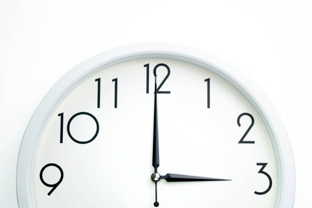 istock A wall clock that announces 3 o'clock on the hour 1335006262
