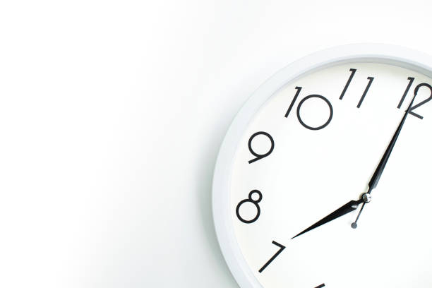 istock A wall clock that announces 7 o'clock on the hour 1335006271