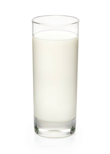 istock Glass of milk isolated on white background 1335010031