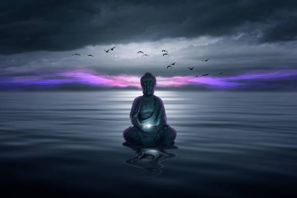istock Buddha statue on lake water 1335010666