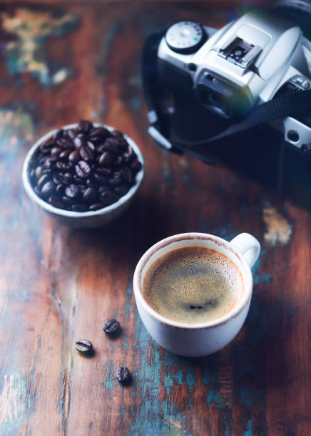 istock Cup of coffee on rustic wooden background. Close up. 1335010876