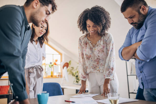 istock Young business team working together 1335014248