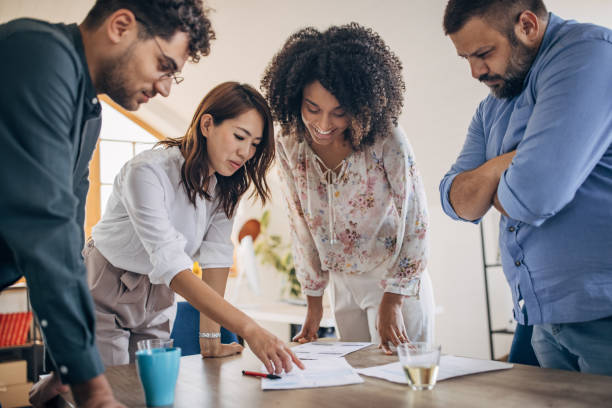 istock Young business team working together 1335014286
