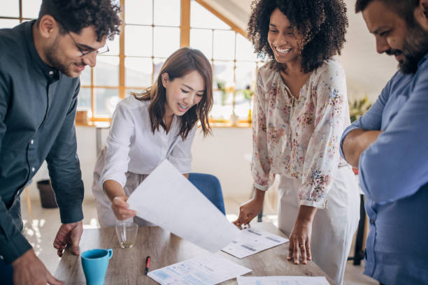 istock Young business team working together 1335014306