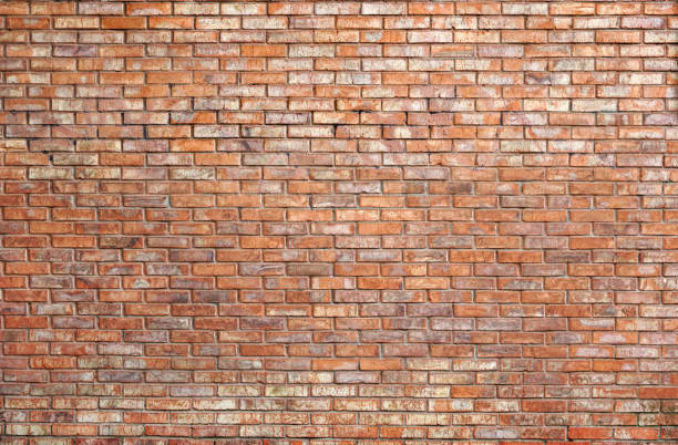 istock Background of an old old brick wall with streaks 1335014414
