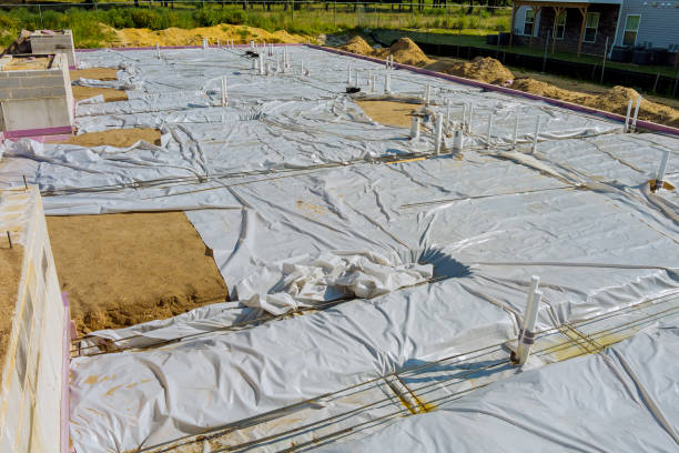 istock Laying in the ground PVC pipes before pouring concrete 1335015879