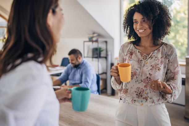 istock Female colleagues on coffee break 1335017476