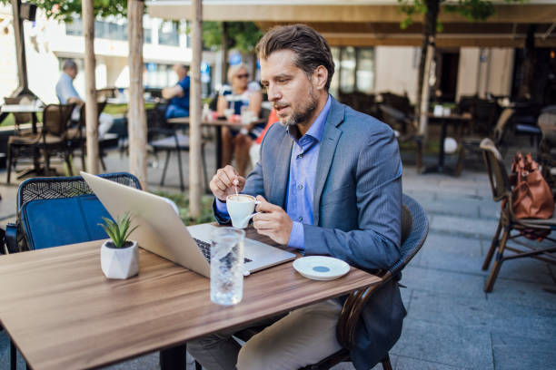 istock Businessman working online and drinking coffee 1335022376