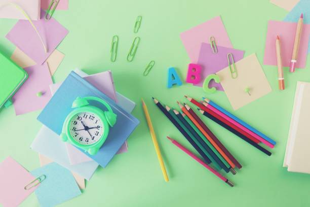 istock Books and stationery on bright background, top view 1335022447