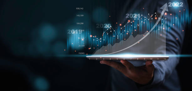 istock Businessman or trader showing glowing virtual technical investment graph chart for analysis stock market , Banking financial and planing concept. 1335026468