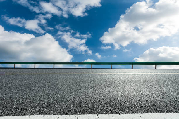 istock Empty and clean asphalt road and sky landscape in summer 1335027147