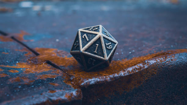 istock Close-up image of a d20 on a rusty metal surface 1335027304