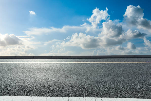 istock Empty and clean asphalt road and sky landscape in summer 1335027606