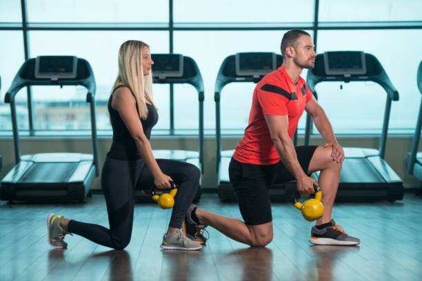 istock Group Of People Workout With Kettle Bell 1335027746