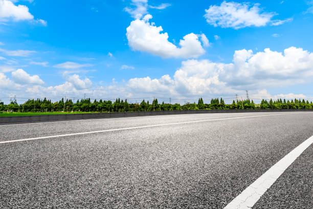 istock Empty and clean asphalt road and sky landscape in summer 1335029476