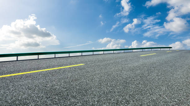 istock Empty and clean asphalt road and sky landscape in summer 1335029608