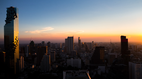 Top view Commercial building in Bangkok city at twilight with skyline,Thailand.