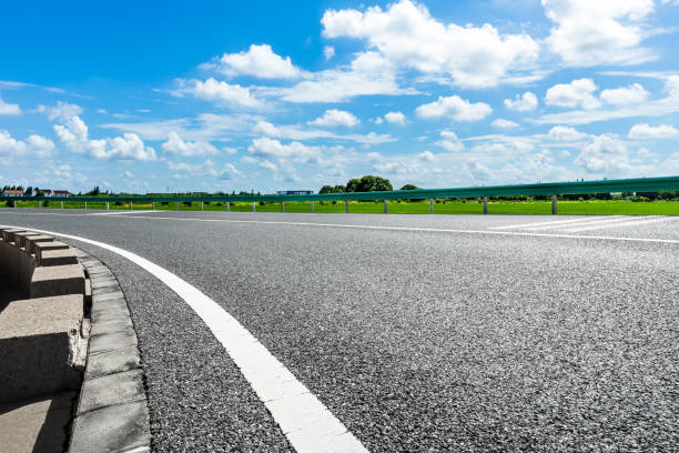 istock Empty and clean asphalt road and sky landscape in summer 1335029781