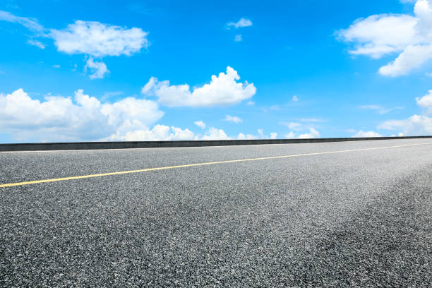 istock Empty and clean asphalt road and sky landscape in summer 1335031066