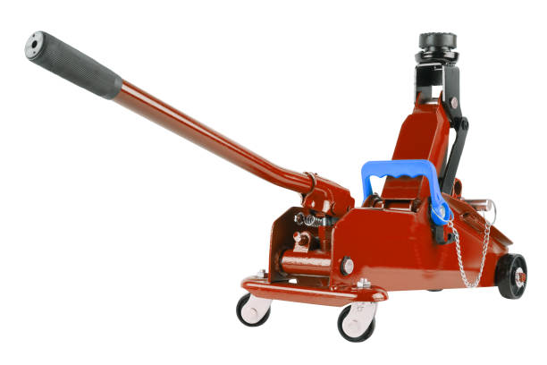 istock red hydraulic car jack isolated on white background, rised up 1335032991