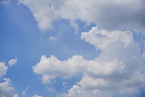 istock Blue sky background with white clouds in nature 1335033216