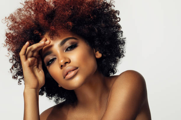 istock Beautiful afro woman with perfect make-up 1335033249