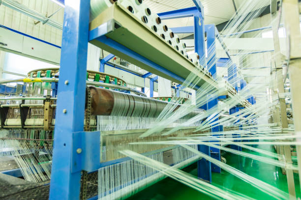 The production workshop of woven belt, A factory workshop where textile belts are produced Packaging bag production workshop, The production workshop of woven belt, A factory workshop where textile belts are produced loom photos stock pictures, royalty-free photos & images