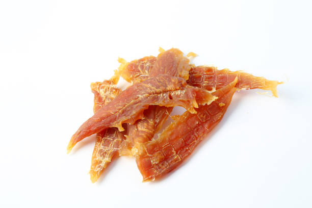 Chicken jerky treat for dogs stock photo