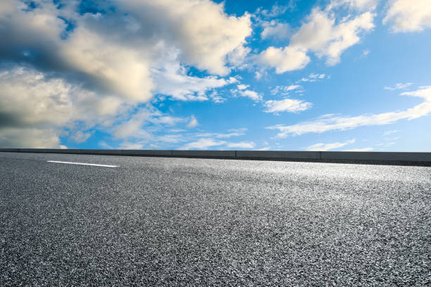 istock Empty and clean asphalt road and sky landscape in summer 1335034620