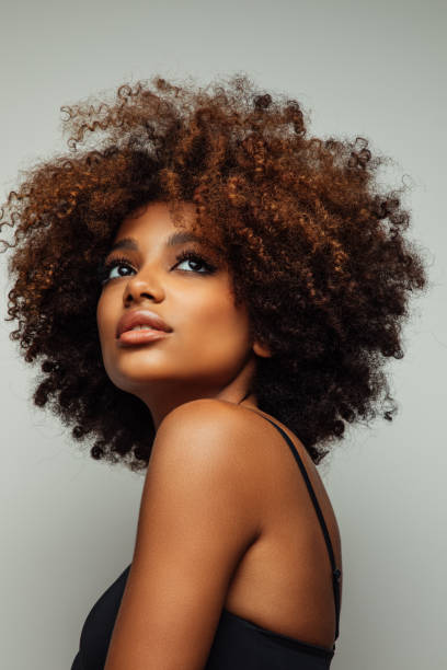 istock Beautiful afro woman with perfect make-up 1335034845