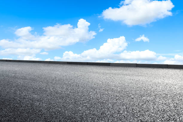istock Empty and clean asphalt road and sky landscape in summer 1335035409