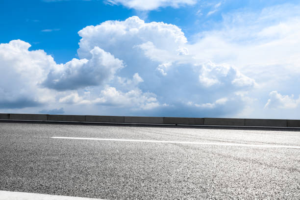 istock Empty and clean asphalt road and sky landscape in summer 1335035469