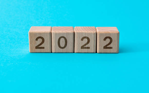 istock Wooden cubes with word 2022 1335036258