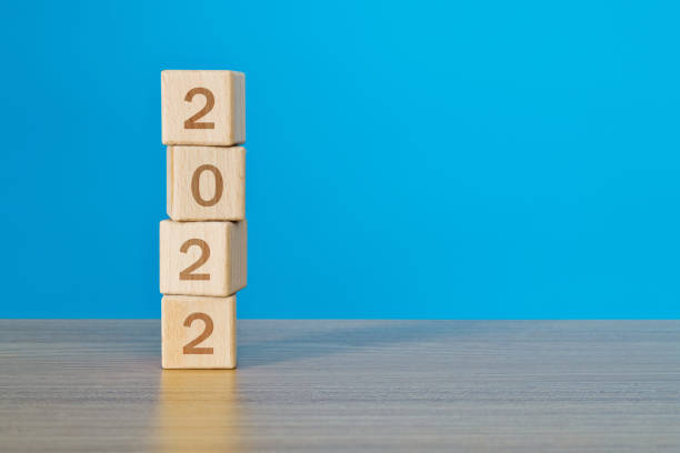 istock Wooden cubes with word 2022 1335036332