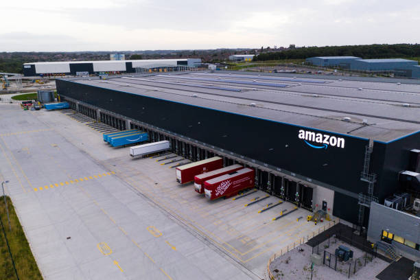 Aerial view of Amazon Prime distribution warehouse and fulfilment centre Leeds, UK - August 13, 2021.  Aerial view of the Amazon warehouse and fulfillment centre in Leeds, West Yorkshire. leeds photos stock pictures, royalty-free photos & images
