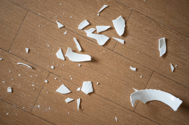istock Floor covered by many pieces of broken plate 1335040134